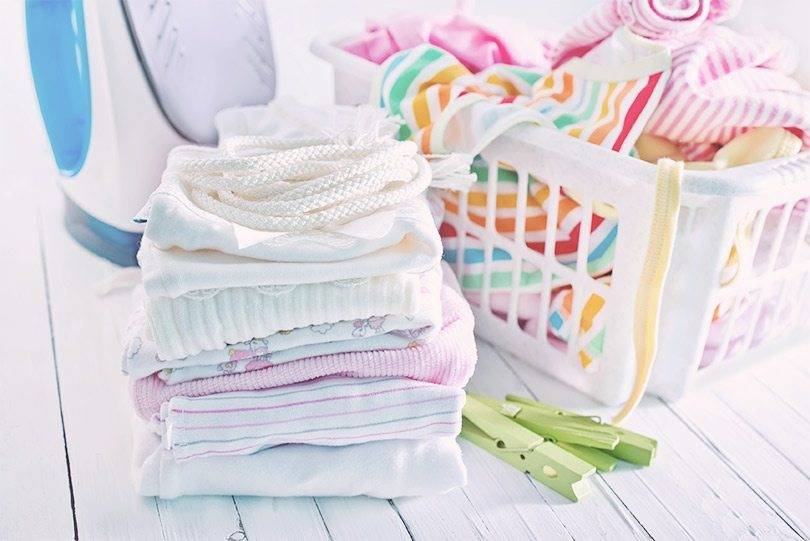 Чем стирать вещи для новорожденного