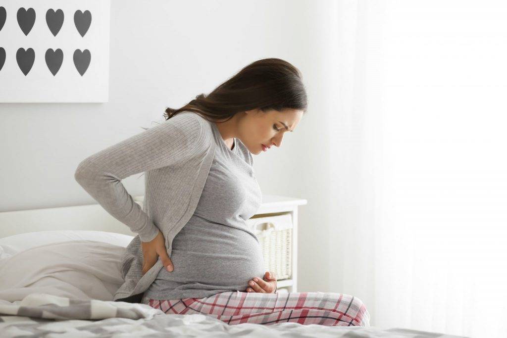 Боли в спине при беременности: когда, почему и что делать?