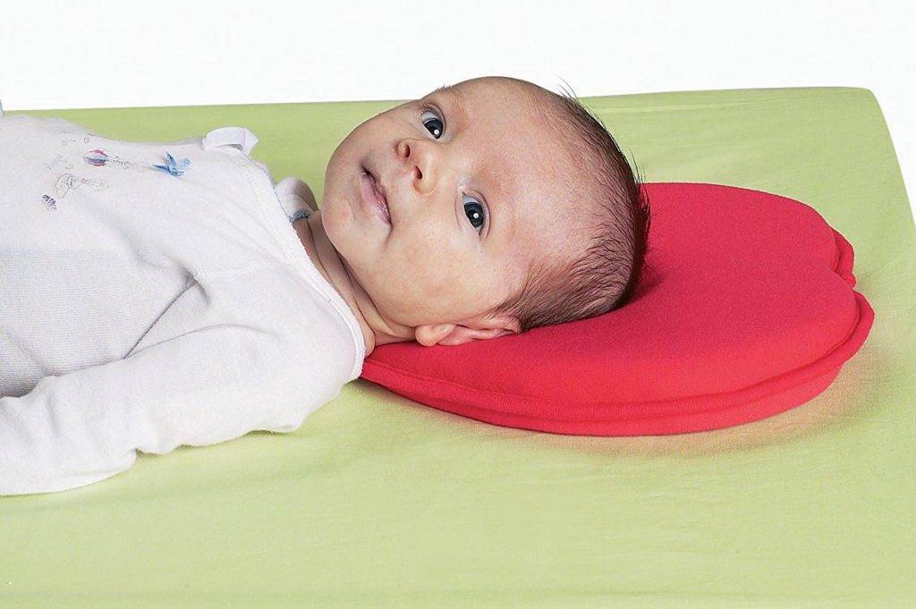 Ортопедическая подушка для новорожденных: как выбрать и пользоваться