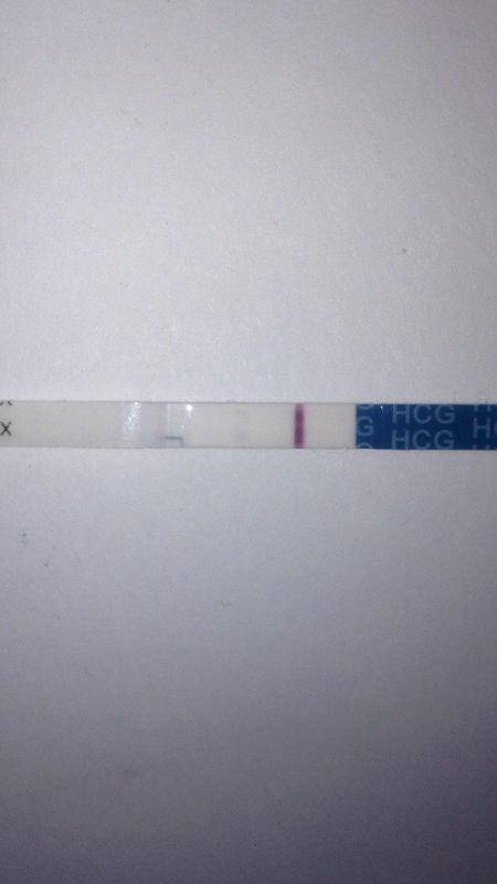 Что означает белая полоска на тесте на беременность
