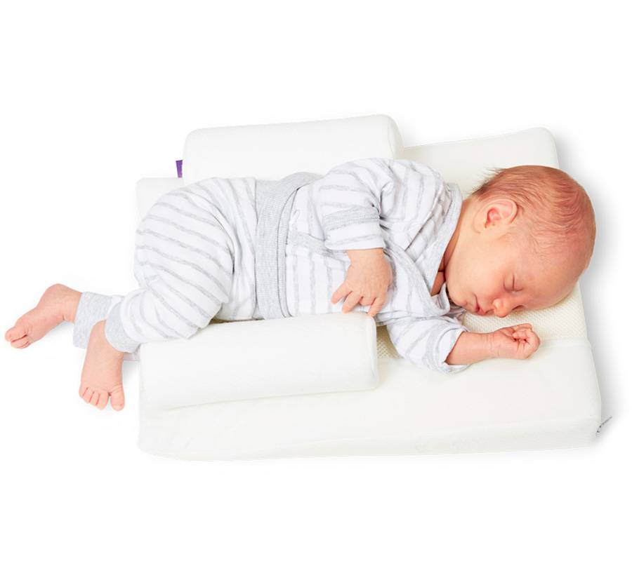 Как выбрать подушку для новорожденного ребенка